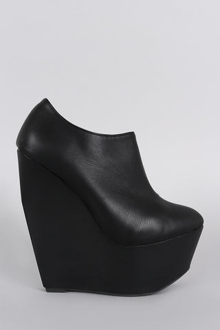 Narrow Platform Heights Wedge Booties